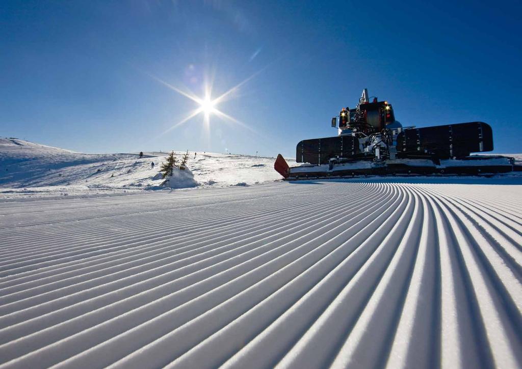 PRINOTH POWER FREZ» FOTO: Fräse von der Seite mit laufender Welle und gut sichtbarer Verarbeitung des Schnees Wszyscy eksperci są zgodni: POWER frez zapewnia