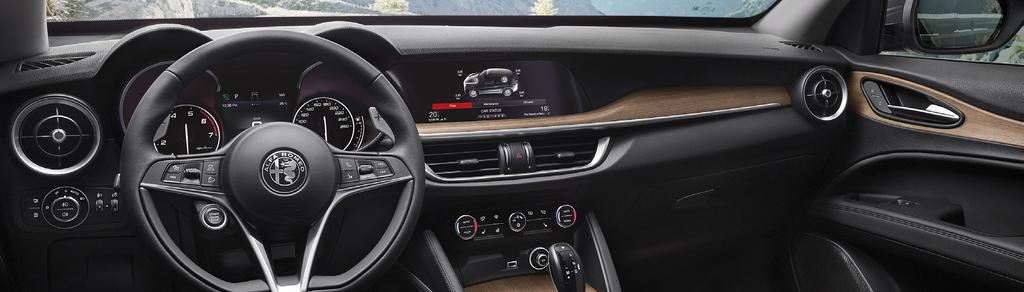 WYBRANE ELEMENTY WYPOSAŻENIA KOMFORT/ FUNKCJONALNOŚĆ STELVIO SUPER EXECUTIVE FIRST EDITION QUADRIFOGLIO 3,5 wyświetlacz TFT między zegarami 7 wyświetlacz TFT pomiędzy zegarami 4GF 1000,- 1000,-
