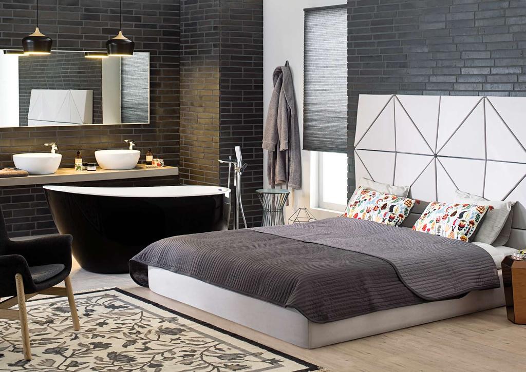 Sypialnia z pokojem kąpielowym Cegły i płytki klinkierowe tworzą piękne i trwałe powierzchnie.