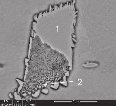 magniþcation: a) 15, b) 300 Pierwiastek, % masowy Obszar analizy 1 2 C 0,8 1,3 Al 6,0 9,6 Si 0,1 0,1 V 0,3 0,2 Mn 1,3 1,8 Fe 91,5 87