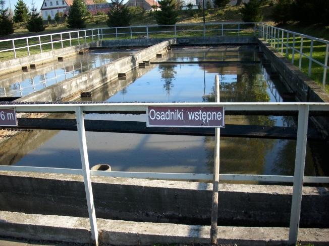 wtórnych wraz z montażem zgarniaczy: powierzchniowego i