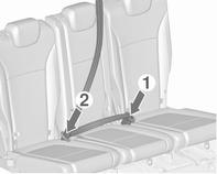 Środkowy pas bezpieczeństwa w drugim rzędzie foteli Środkowy fotel wyposażony jest w specjalne trzypunktowe pasy bezpieczeństwa. Pociągnąć sprzączki wraz z pasem z uchwytu w dachu.