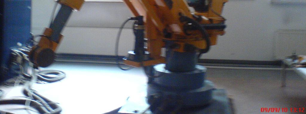 wpółrzędnymi ylindryznymi końówki robozej względem