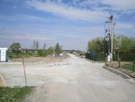 warstwy ścieralnej z betonu asfaltowego, chodnikami, ciągiem pieszorowerowym i zjazdami z kostki betonowej, przebudowę i budowę kanalizacji deszczowej, budowę
