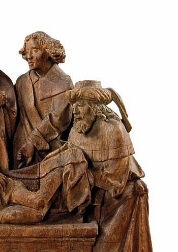 szafę gabinetową, drewnianą konsolę w stylu epoki, rzeźbę Pieta z