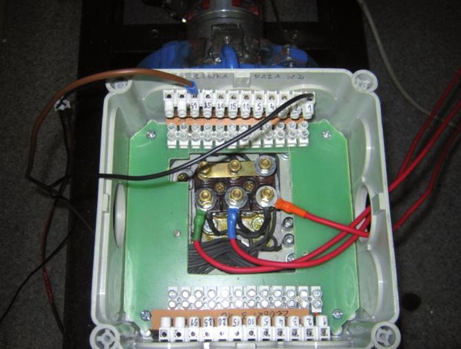101 fan cover or inside the bearing shield [6] it is rarely mounted on the motor body [3]. Fig. 1 shows a view of the measuring coil used in the laboratory and its assembly inside the motor housing.