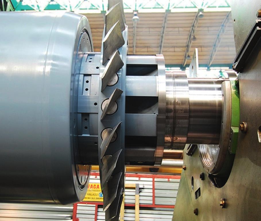 Fig. 3. Axial cooling system in turbogenerator excitation winding Photo 2. New fan mounted on rotor shaft Photo 3. New rotor fan shield with rear guide vanes Fig.