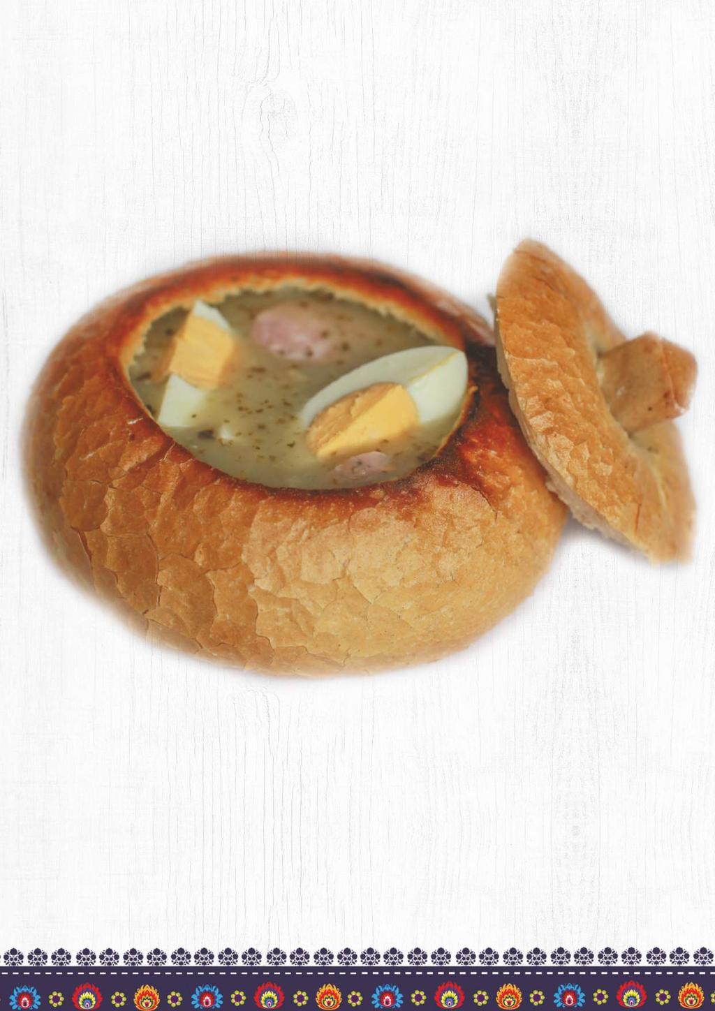 25. Żurek w chlebie (gotowany na zakwasie z wędzonką i chrzanem, podawany z jajkiem i białą kiełbasą) 16,90 zł / 300ml Sour rye soup, served in bread (cooked sourdough with smoked bacon and