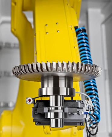 Opcja automatyzacyjna Robot podający 25 HELITRONIC POWER DIAMOND 400 11 1 Robot podający 25 Do narzędzi w uchwycie HSK o masie całkowitej do 20 kg i średnicy do 315 mm w