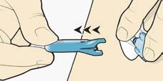 Aby odłączyć serter od podstawki, chwyć serter umieszczając kciuk na oznaczeniu odcisku kciuka.