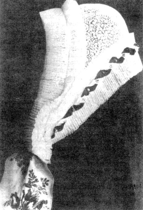 Pierwsze w kolejności zdjęcie rudzkie, zamieszczone w opracowaniu Barbary Bazielich: Śląskie stroje ludowe [Katowice 1988], przedstawia czepiec tiulowy z kanicami. [Fotografia 4.] Fotografia 4.