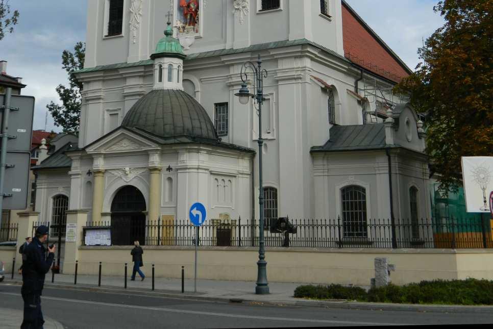 Floriana z naroża ulic: Warszawskiej i Kurniki, którego początki