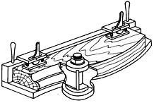 Zadanie 21. Przedstawione na rysunku oprzyrządowanie służy do frezowania krzywoliniowego elementów z płyty wiórowej. prostoliniowego elementów z płyty wiórowej.