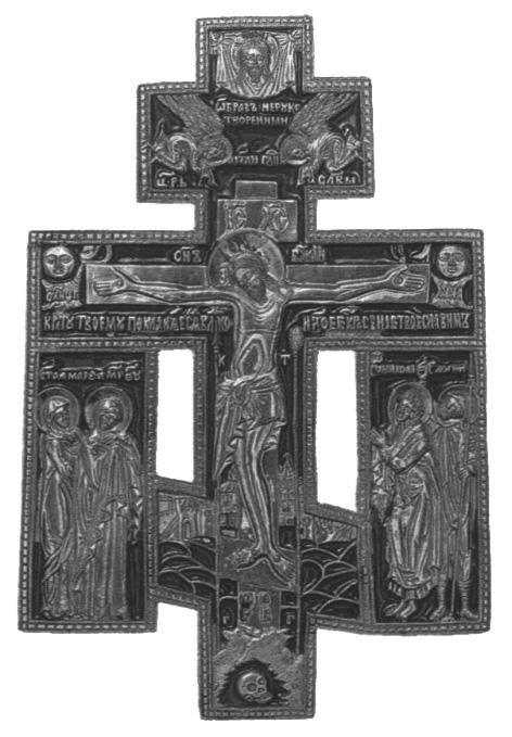 Podstawą jest krzyż prawosławny trzybelkowy z ukośną belką dolną, ale belka środkowa połączona jest bocznymi pionowymi belkami z ukośną.