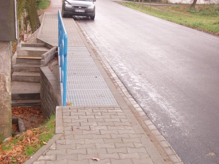 m 2 nowej nawierzchni asfaltowej o szer.
