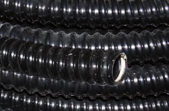 Rury ochronne i dławnice do rur / Protective tubes and glands for pipes / Rura ochronna spiralna typu WTG wykonana z PCV : czarny (RAL 9005) Wytrzymałość na ściskanie: 320 N Temperatura pracy: -5 +60