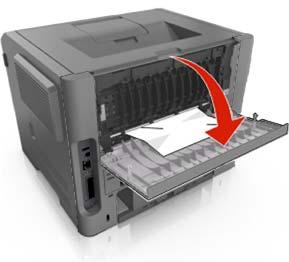 1. Naciśnij przycisk po prawej stronie drukarki, a następnie otwórz przednie drzwiczki. 2. Ostrożnie opuść tylne drzwiczki.