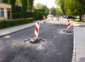 wykonano łącznie 3.411,5 m 2 nowej warstwy wyrównawczej, a na niej nawierzchnię ścieralną z mieszanki BBTM 8 B. Wykonano również utwardzenie poboczy z kruszywa łamanego stabilizowanego mechanicznie.