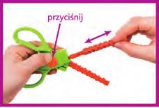 motyl Przyciśnij przycisk, aby wymienić ostrze.