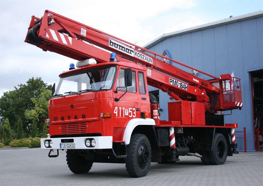 Podnośnik koszowy SH 18 Przykład podnośnika SH 18 Źródło: https://www.czerwonesamochody.com/details.php?image_id=45544 Podnośnik koszowy. W planach jako wyposażenie chojnickiej jednostki OSP.