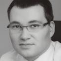 Warszawskiego. Pe³ni³ liczne funkcje w administracji publicznej, w tym: Dyrektora Generalnego w Ministerstwie Rynku Wewnêtrznego i w Ministerstwie Przemys³u i Handlu.
