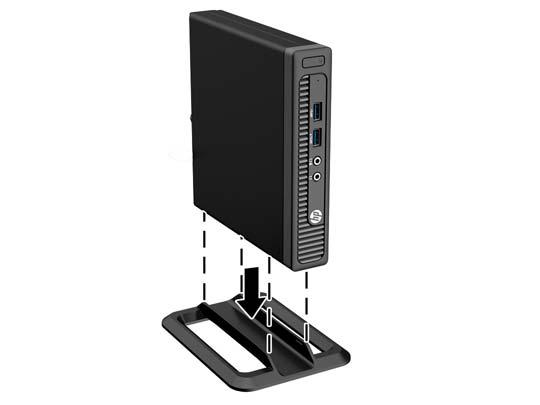 Zmiana konfiguracji typu desktop na konfigurację typu tower Komputer może być ustawiony w pozycji pionowej po wykorzystaniu opcjonalnej podstawy, którą można kupić w firmie HP. 1.