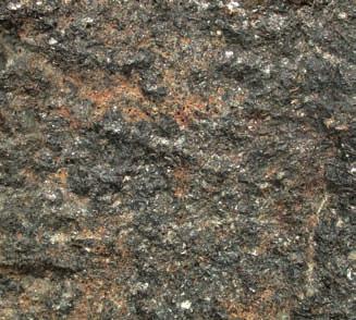 powstały gdy gorąca granitowa magma podgrzała skały osłony do temperatury przekraczającej 600 C.