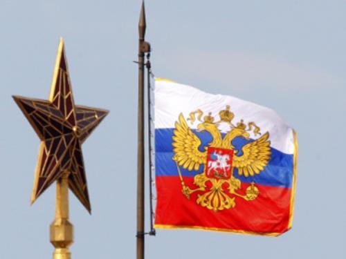 Aktualne weksylia państwowe Federacji Rosyjskiej : (a)- flaga Federacji