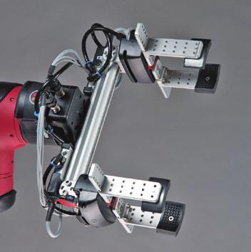 przyssawki twarde), generator podciśnienia z tłumikiem oraz analogowy czujnik próżni.