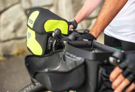 xing (light not included); lock holster; carrying handle; removable chest and waist straps; reective logo.