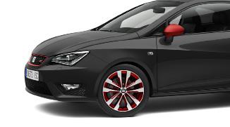 WYPOSAŻENIE FELGI I PAKIETY STYLISTYCZNE Zewnętrzny pakiet RED i felgi DYNAMIC RED 17-calowe felgi aluminiowe DYNAMIC TITANIUM w kolorze tytanowym 1656 17-calowe felgi aluminiowe DYNAMIC RED w