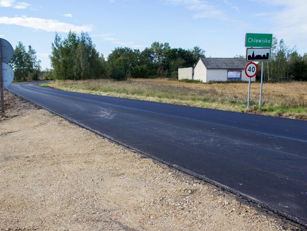 drogi oraz ułożenie warstwy ścieralnej asfaltu.