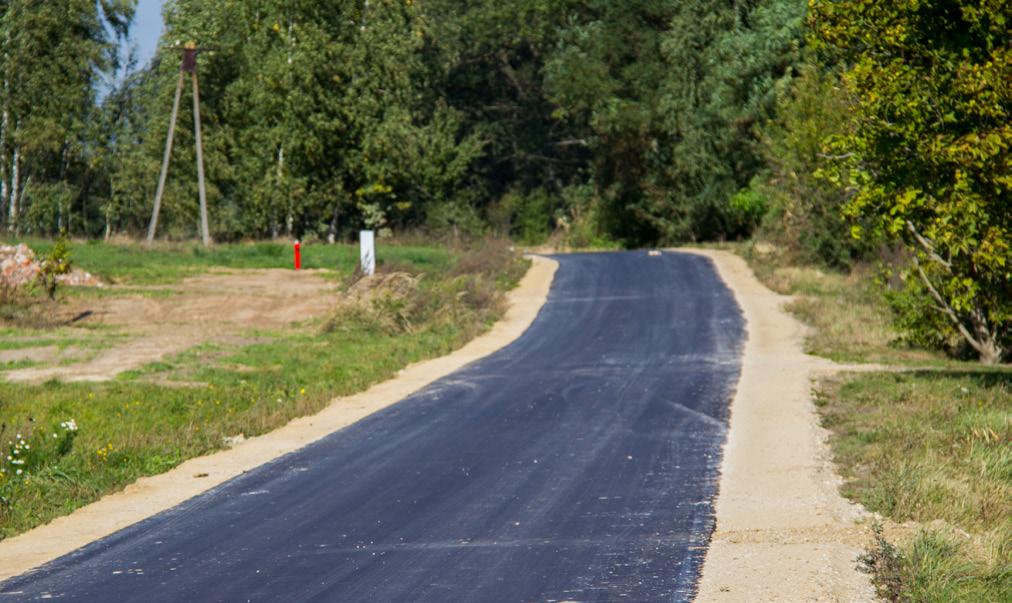 590 m polegały na wyprofilowaniu   asfaltu.