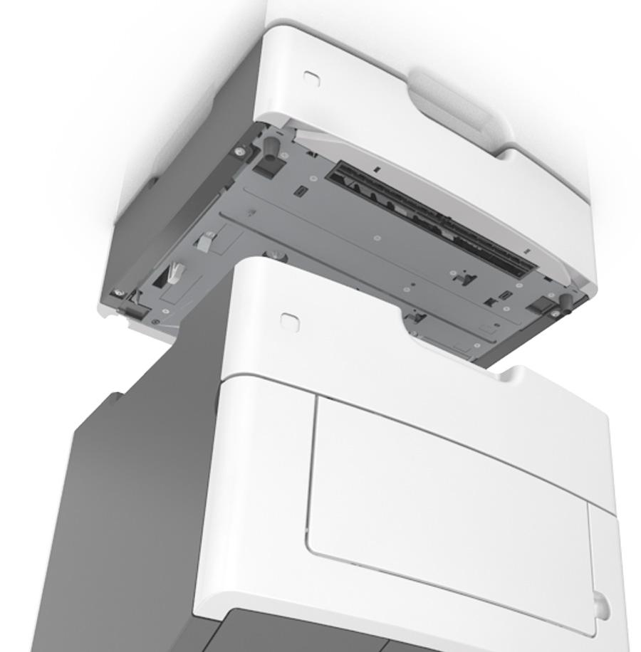 Dodatkowa konfiguracja drukarki 17 4 Usuń z zasobnika wszystkie pozostałości opakowania. 5 Włóż zasobnik do podstawy. 6 Umieść zasobnik w pobliżu drukarki.