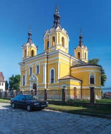 Worth seeing A baroque, larch church of Annunciation of the Virgin Mary from 1727 with a miraculous image of Our Lady of Scapular, eighteenth-century belfry of fortified type, quadrilateral square