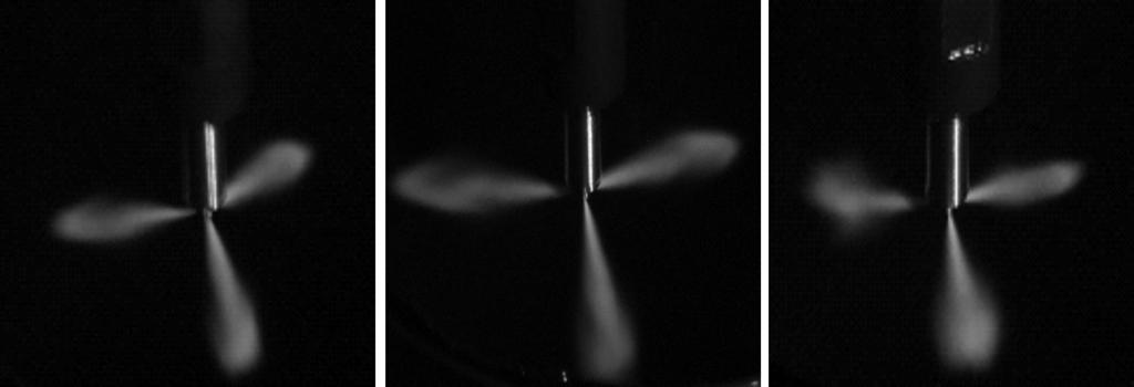 a) b) c) Fig. 3. Jets of fuel from a multipoint injector: а) conventional, b) with increased roughness of the non-working part of the needle, c) with a turbulizer Rys. 3. Strugi paliwa we wtryskiwaczu wielootworowym: а) konwencjonalny, b) ze zwiększoną chropowatością niepracującej części iglicy, c) z turbulizatorem 3.