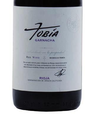 CENA: 49 zł Tobia Selección Crianza DOC Rioja Doskonała crianza będąca kupażem odmian: tempranillo, graciano i garnacha, leżakująca w dębie aż 21