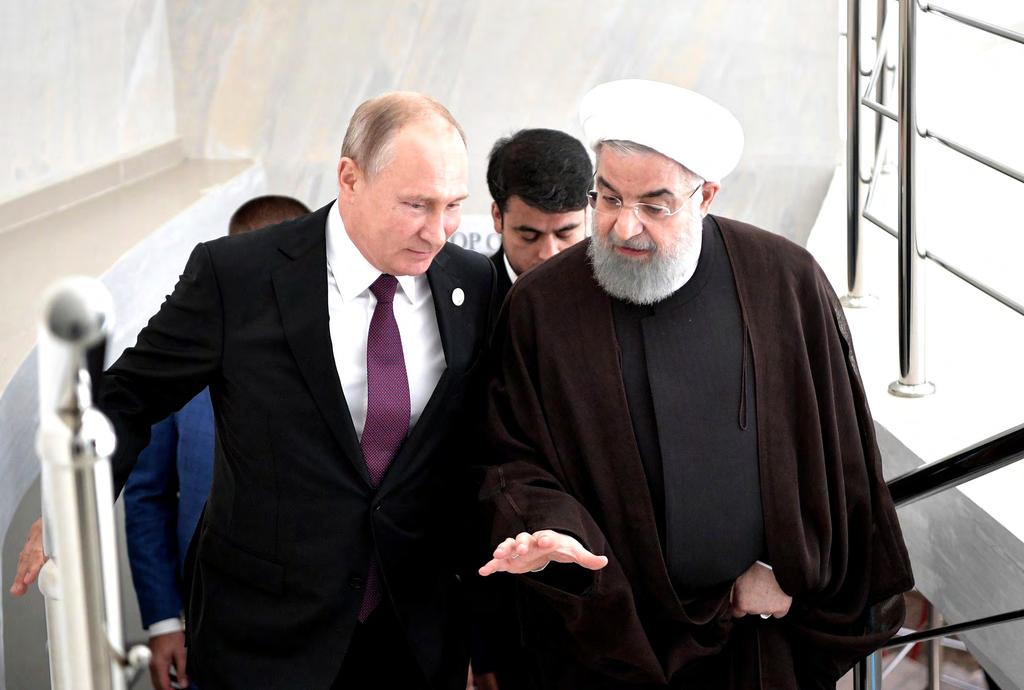 WŁADIMIR PUTIN Z PREZYDENTEM IRANU HASSANEM ROUHANI. ŹRÓDŁO: KREMLIN.RU Rosja i Iran zdecydowanie zyskują dzięki zakazowi stacjonowania obcych wojsk w ramach akwenu.