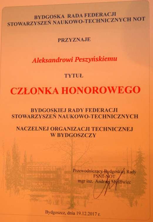 Aleksander Peszyński odbiera