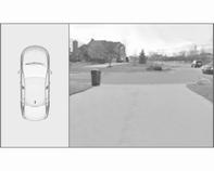 242 Prowadzenie i użytkowanie Ekran wyświetlacza informacyjnego jest podzielony na dwie części: z lewej strony wyświetla się widok znad pojazdu, a z prawej widok z przodu lub z tyłu pojazdu, w