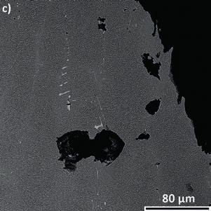 Microstructural changes after creep: a) dendrite core, b) interdendritic space, c) voids inside the material Rys. 7.