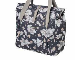 The roomy bag, with a breathtaking design of flowers in soft colors, is made to make an