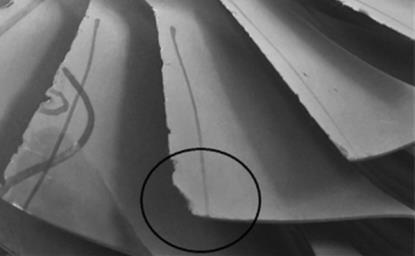 The compressor rotor damaged by foreign objects (photo P. Rutkowski) Rys. 4.