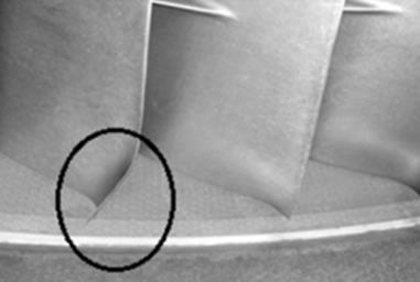 Przybyła) Fig. 6. Tears of the blades of the compressor rotor (photo B.