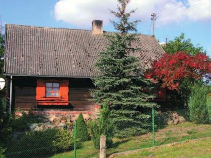 Fot. 9. Zabytkowy dwór drewniany w Gródku Michała i Teresę Sczańskich.