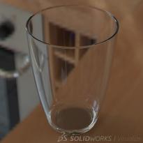 SOLIDWORKS Visualize Na przykład ta scena przedstawia szkło o wyglądzie bryłowym przezroczystym.