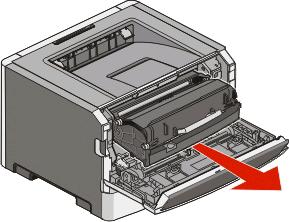 2 Podnieś i wyciągnij z drukarki zespół obejmujący zestaw bębna światłoczułego i kasetę z tonerem. Połóż zespół na płaskiej, czystej powierzchni.