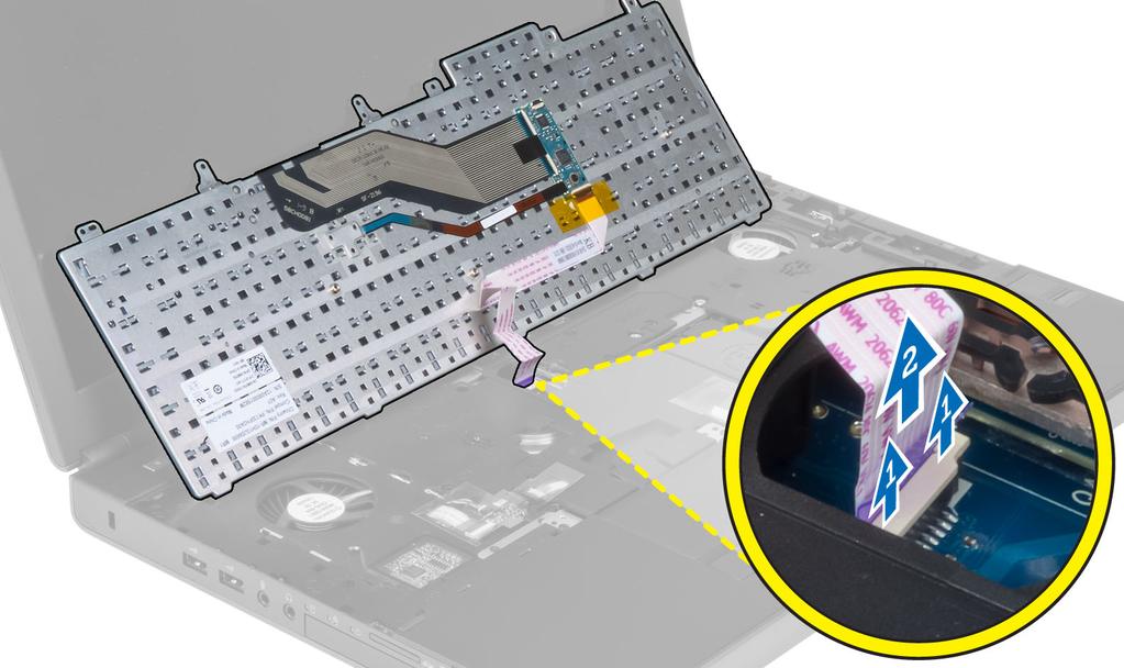 Instalowanie klawiatury 1. Podłącz kabel danych klawiatury do złącza na płycie systemowej. UWAGA: Upewnij się, że kabel danych klawiatury został dobrze ułożony. 2.
