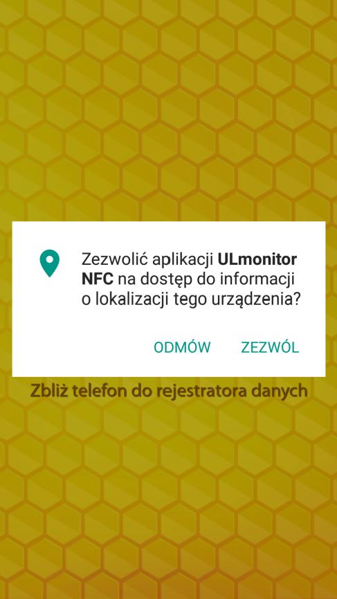 Następnie trzeba odsunąć telefon na odległość około 20 cm, przyłożyć go ponownie do rejestratora i trzymać tak długo aż w dolnej części ekranu na chwilę wyświetlony zostanie zielony komunikat
