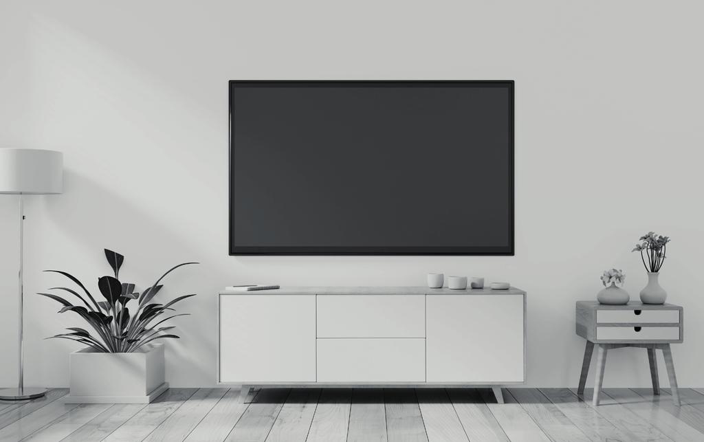 Kanapa a przed nią telewizor. Dla wielu takie połączenie to nadal obowiązkowy element każdego salonu.